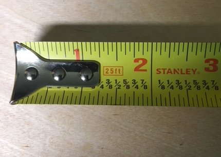 Fractional calibrated tape measure tape